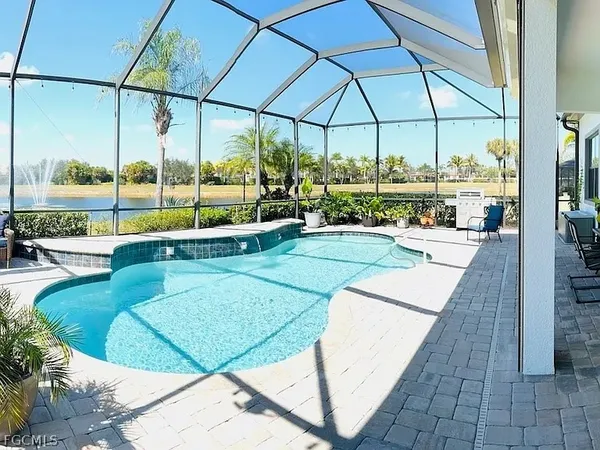 a view of a swimming pool with a porch