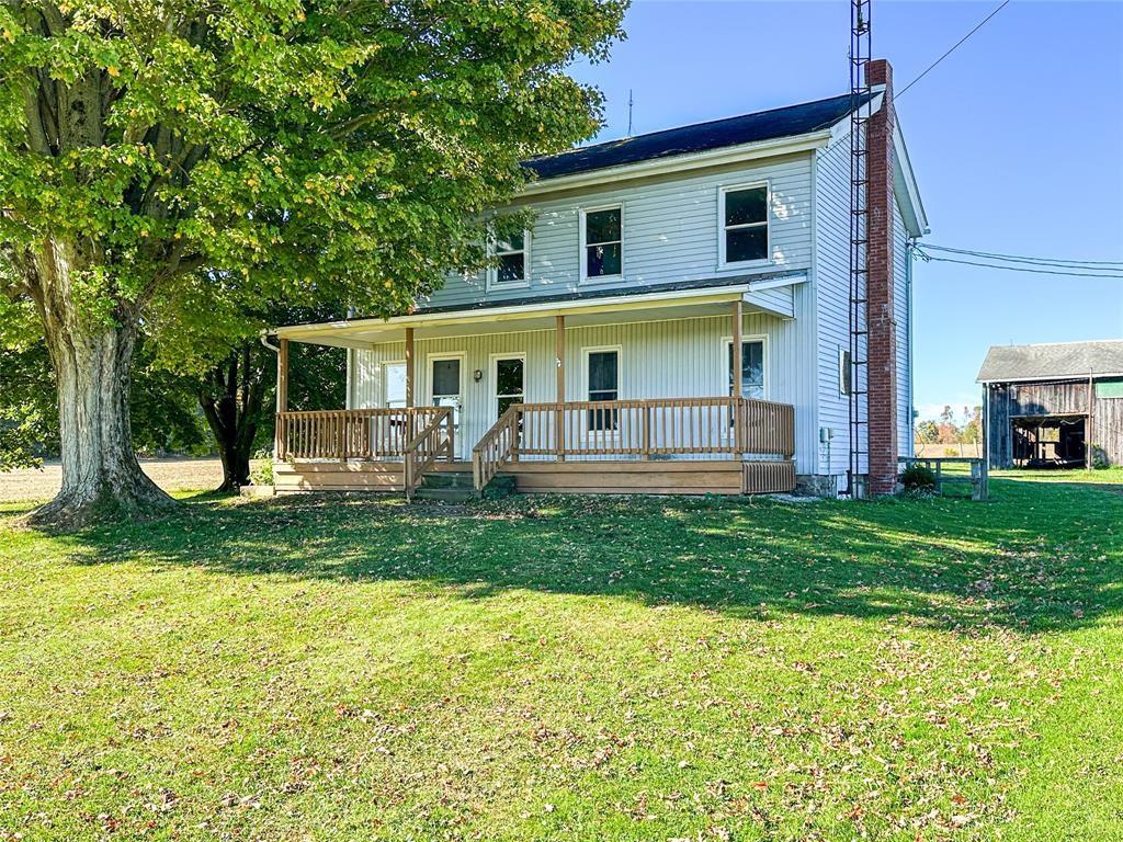 17263 Airport Road Linesville, PA 16424 - Photo 1 of 50 a view of a house with a backyard