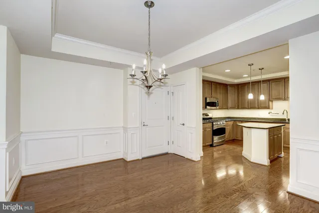 a view of a kitchen with a sink and dishwasher
