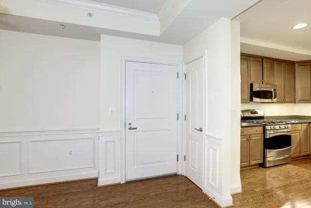 a view of a kitchen with a sink and a stove