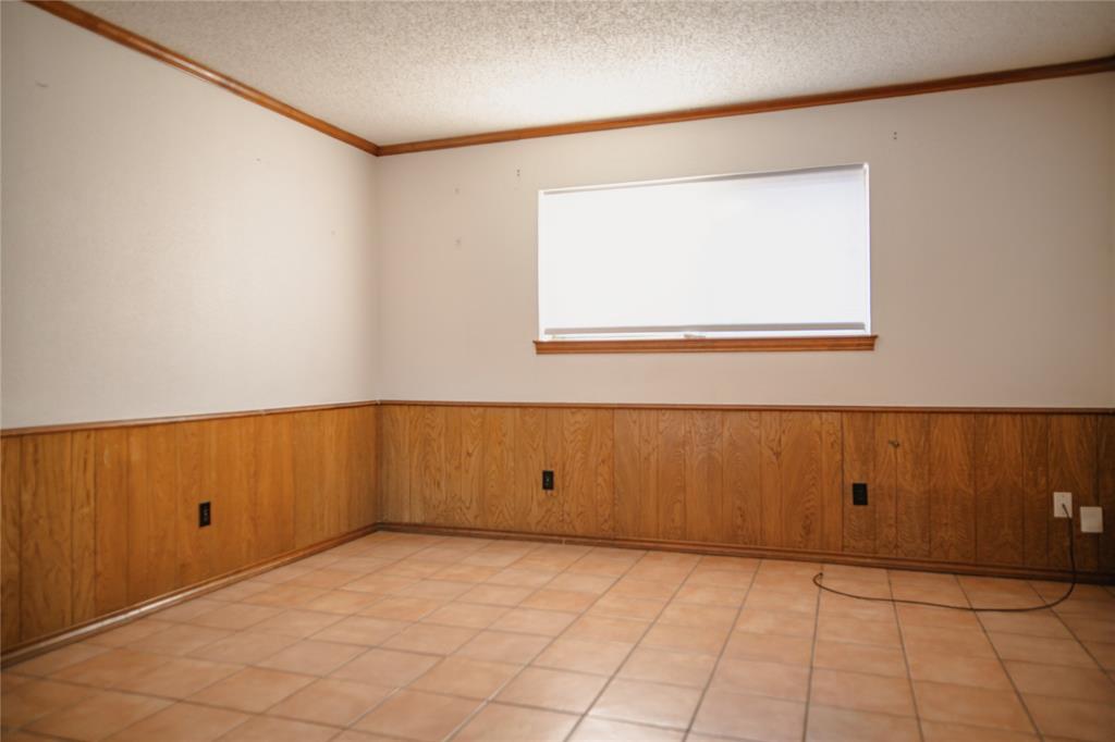9029 Church Road Dallas, TX 75231 - Photo 18 of 40 a view of room with window