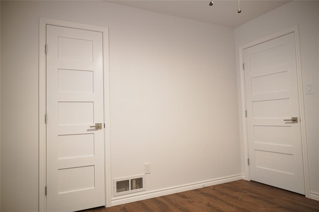 9029 Church Road Dallas, TX 75231 - Photo 30 of 40 a view of an empty walk in closet