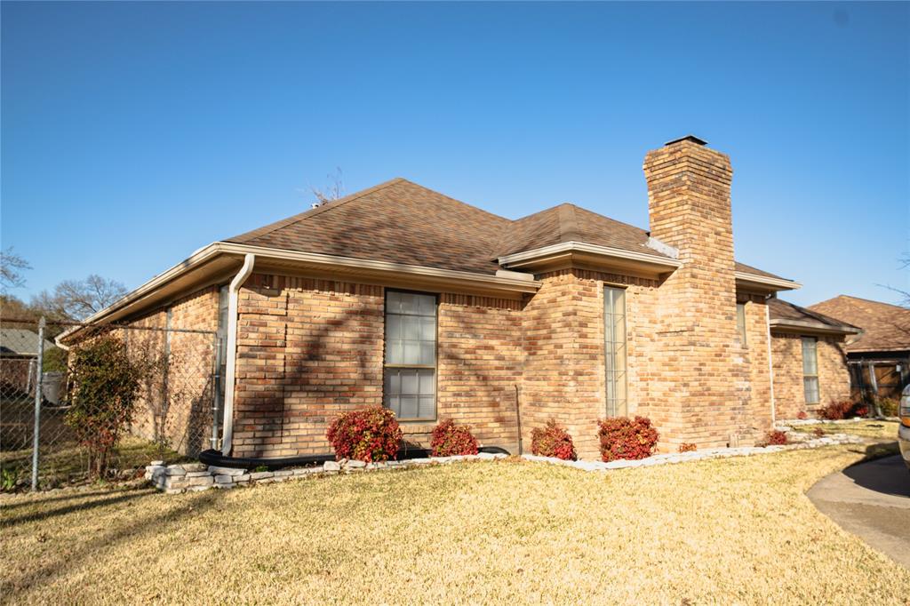 9029 Church Road Dallas, TX 75231 - Photo 3 of 40 a view of a house with a yard and sitting area