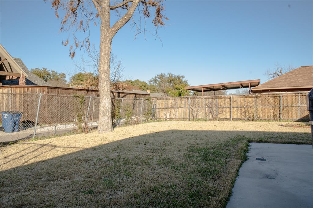 9029 Church Road Dallas, TX 75231 - Photo 37 of 40 a view of back yard of the house