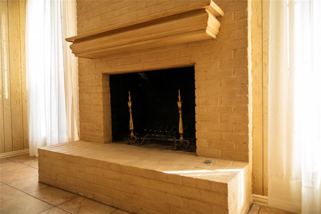 9029 Church Road Dallas, TX 75231 - Photo 8 of 40 a bedroom with a bed and a window