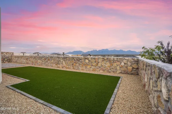 a view of the house with a mountain view