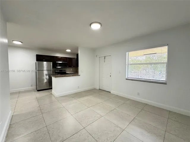 a view of a kitchen with a sink