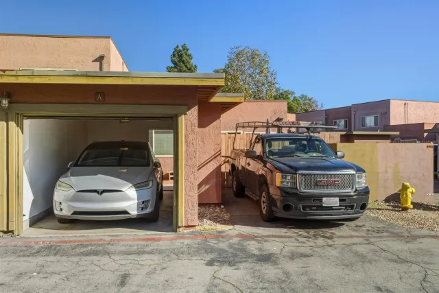 an aerial view of a houses with yard
