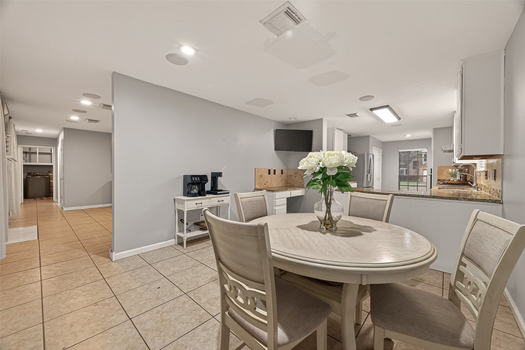 12206 Paddock Way Houston, TX 77065 - Photo 11 of 44 a dining room with furniture and wooden floor