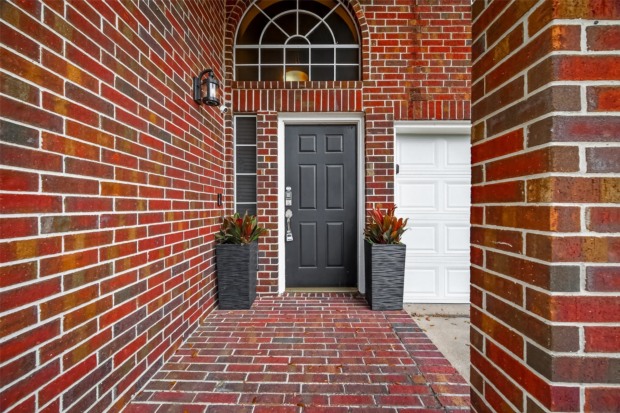 12206 Paddock Way Houston, TX 77065 - Photo 3 of 44 a view of a door with a door and wooden floor