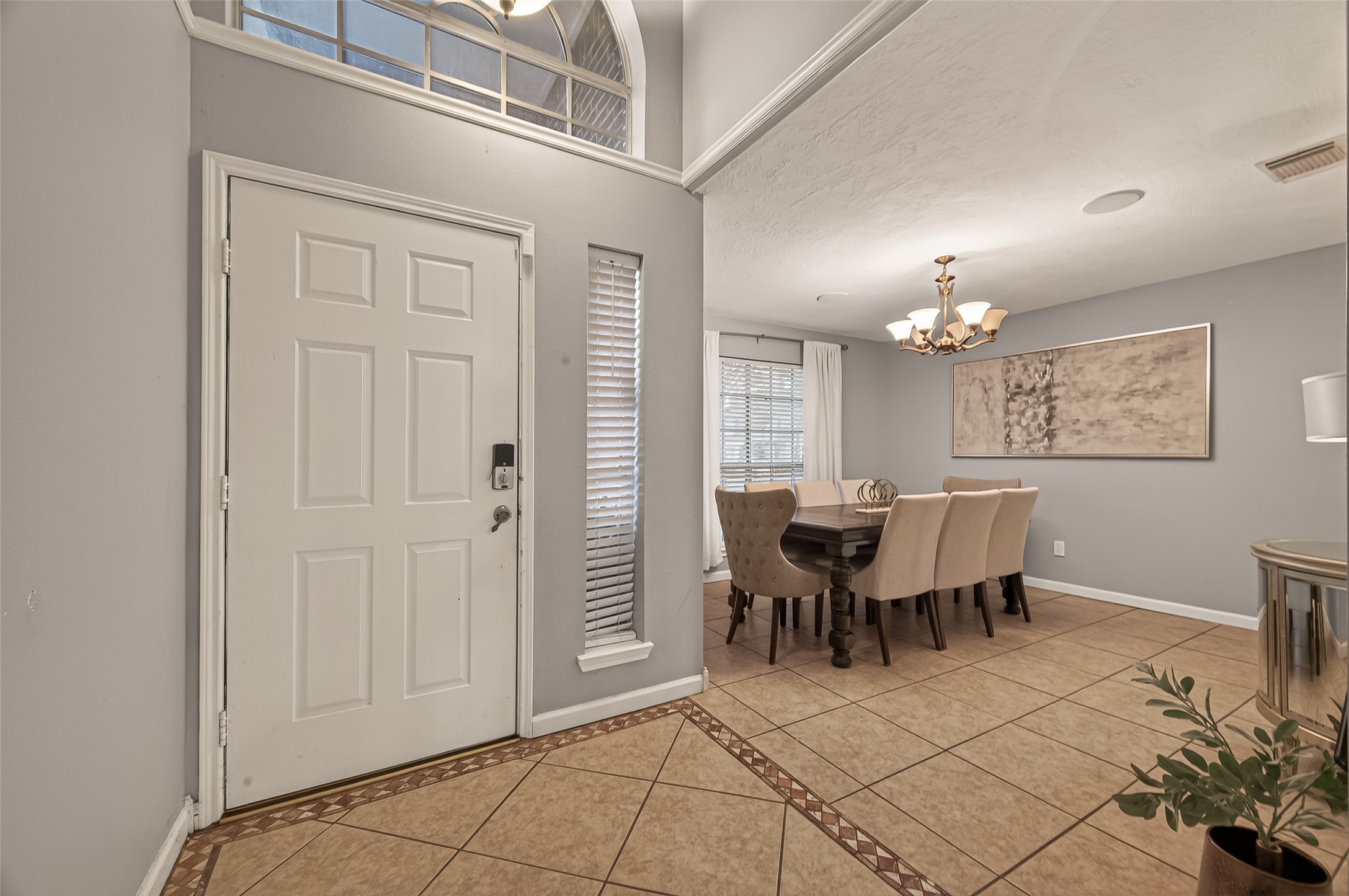 12206 Paddock Way Houston, TX 77065 - Photo 4 of 44 a view of a dining room with furniture