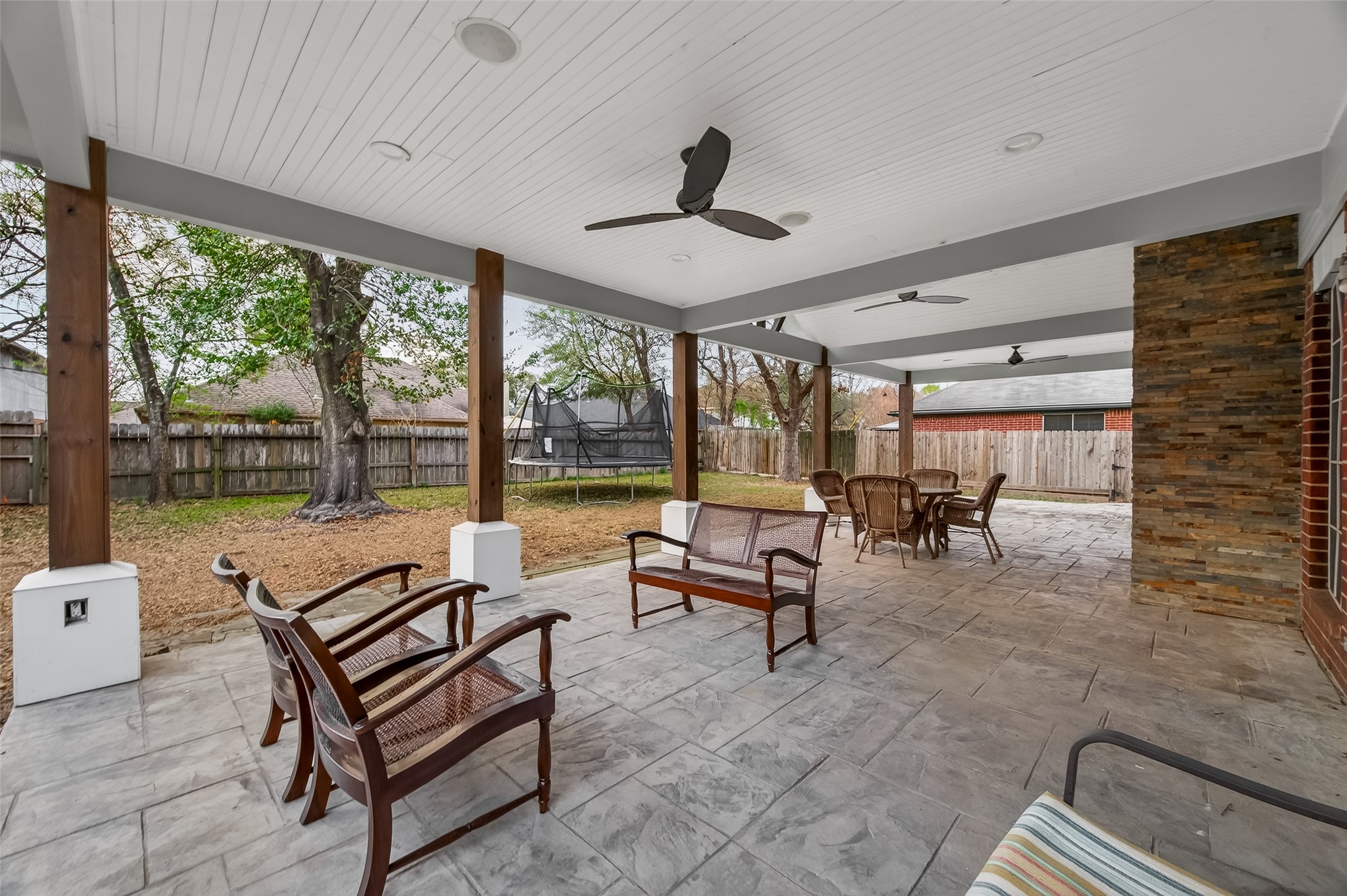 12206 Paddock Way Houston, TX 77065 - Photo 41 of 44 a living room with furniture and a floor to ceiling window