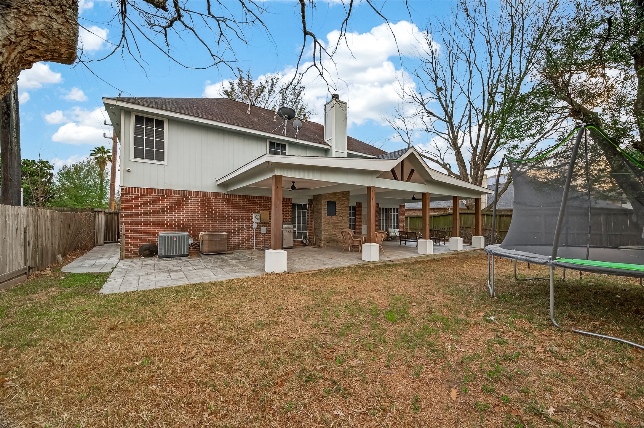 12206 Paddock Way Houston, TX 77065 - Photo 44 of 44 a front view of a house with a yard