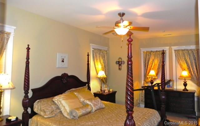 7810 Knox Ridge Road Huntersville, NC 28078 - Photo 12 of 18 a bedroom with a bed dresser and a window