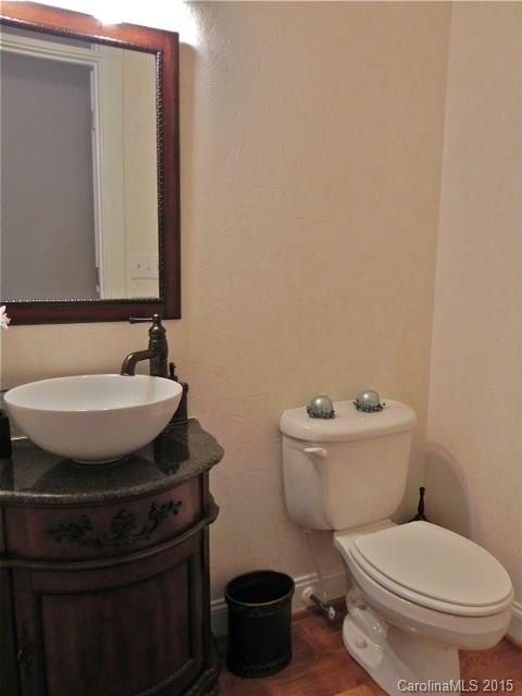 7810 Knox Ridge Road Huntersville, NC 28078 - Photo 5 of 18 a bathroom with a sink and a toilet