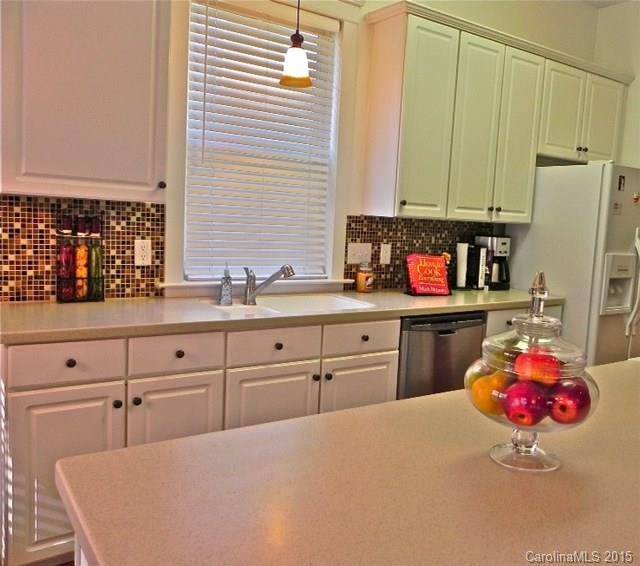 7810 Knox Ridge Road Huntersville, NC 28078 - Photo 7 of 18 a kitchen with cabinets and window