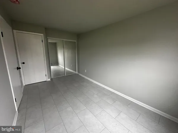 a bathroom with a sink a toilet and bathtub
