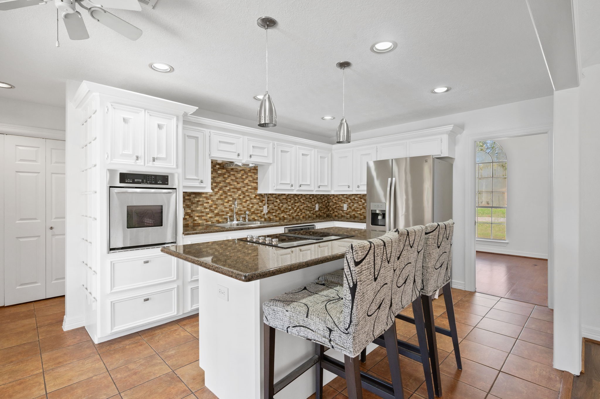 7302 Maple Lane Baytown, TX 77521 - Photo 7 of 24 Kitchen Open to Family Room