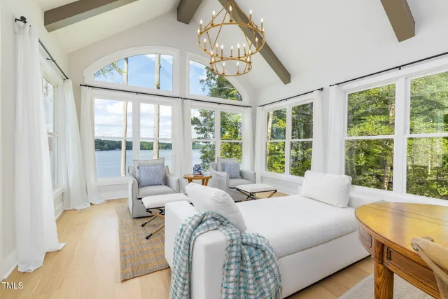 a view of a patio with a dining table and chairs