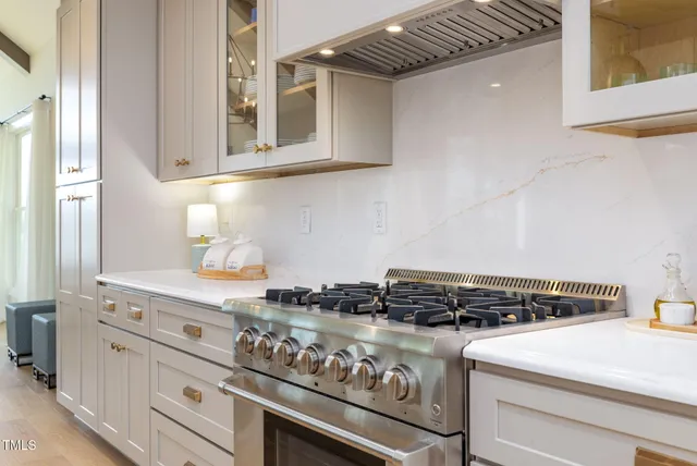 a spacious bathroom with a double vanity sink and a mirror