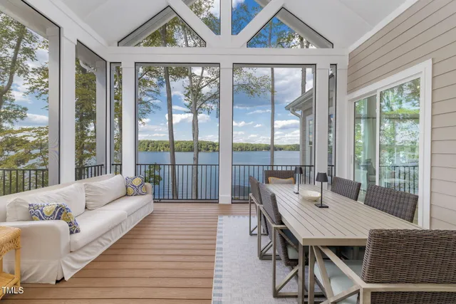 a bedroom with a bed and a mirror