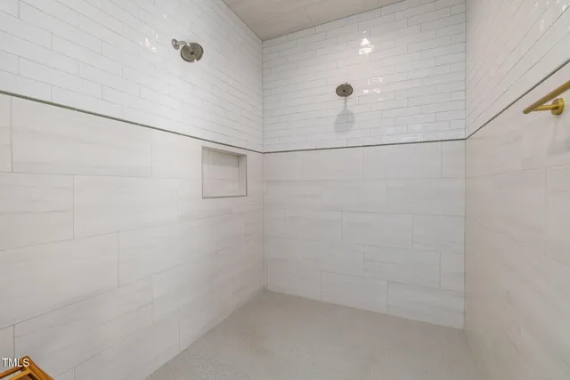 a bathroom with a granite countertop sink mirror and double