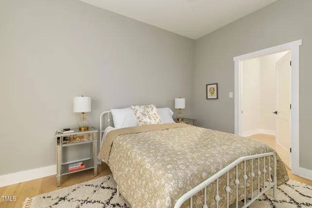 an aerial view of a house with a yard basket ball court and outdoor seating