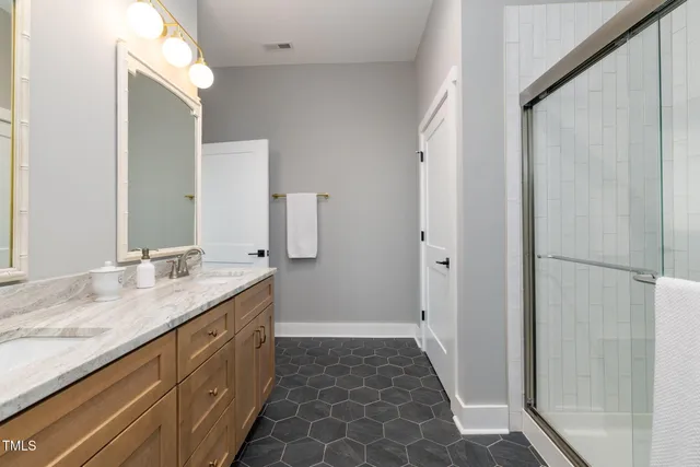 a view of house with backyard and outdoor seating