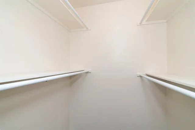 a view of a room with racks on the wall