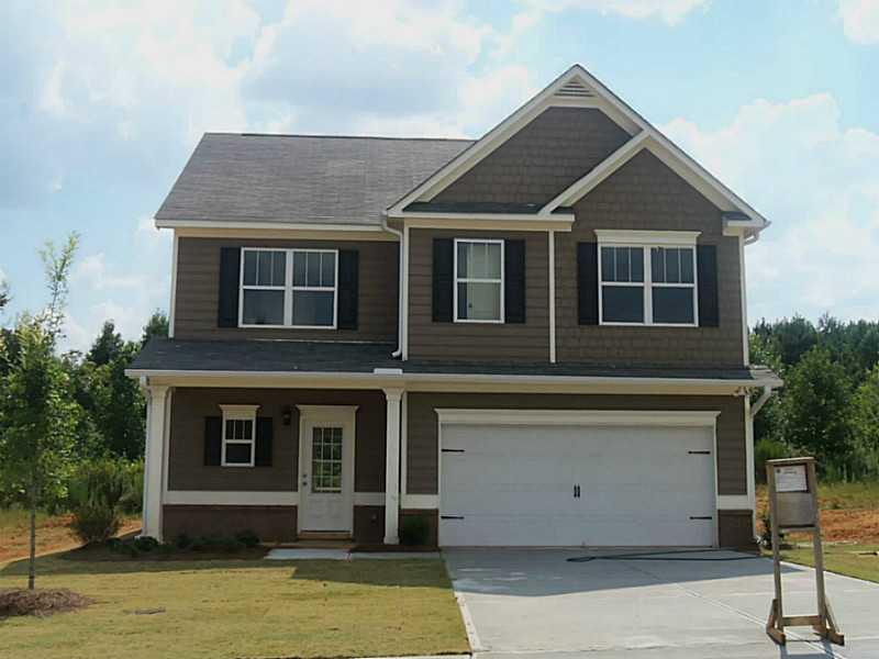 136 Renford Road Ball Ground, GA 30107 - Photo 1 of 1 Exterior Front. Backs to PRIVATE GREEN SPACE. Flat Back yard before goes into common area. Hard to find homesite.