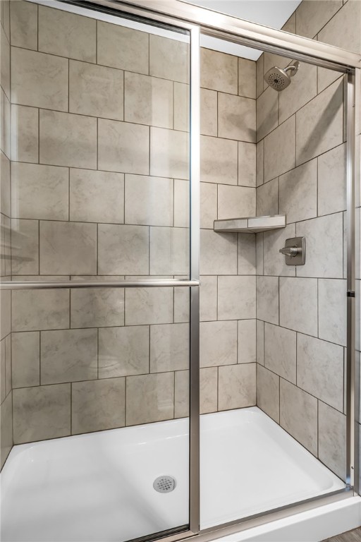 1218 High Street Navasota, TX 77868 - Photo 11 of 16 a bathroom with a bathtub and shower