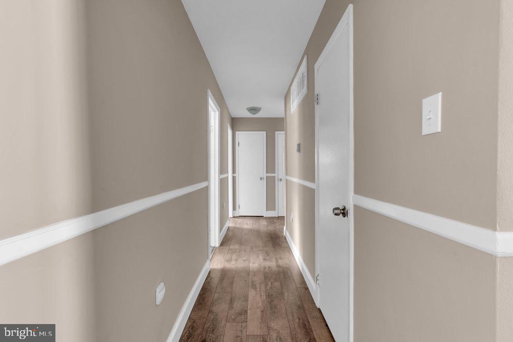 27 Litle Avenue Delran, NJ 08075 - Photo 13 of 20 a view of a hallway with wooden floor and entryway