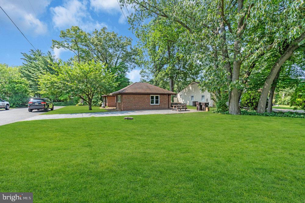 27 Litle Avenue Delran, NJ 08075 - Photo 3 of 20 a front view of a house with garden