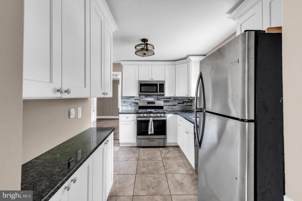 27 Litle Avenue Delran, NJ 08075 - Photo 7 of 20 a kitchen with a refrigerator sink and microwave