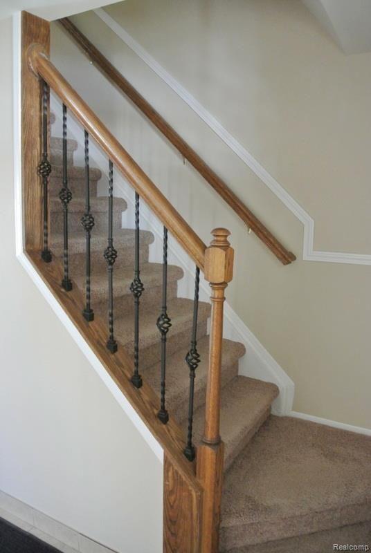 509 Worthington Road Canton, MI 48188 - Photo 13 of 33 Spindled Stairway
