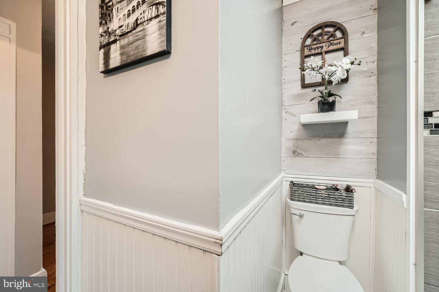 1215 West Old Cold Spring Lane Baltimore, MD 21211 - Photo 20 of 33 a bathroom with a toilet and a shower
