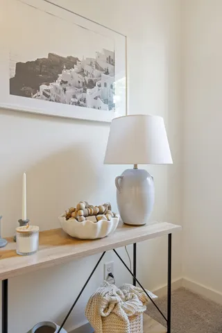 a living room with furniture and decor