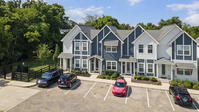 a view of a parked cars in front of a house