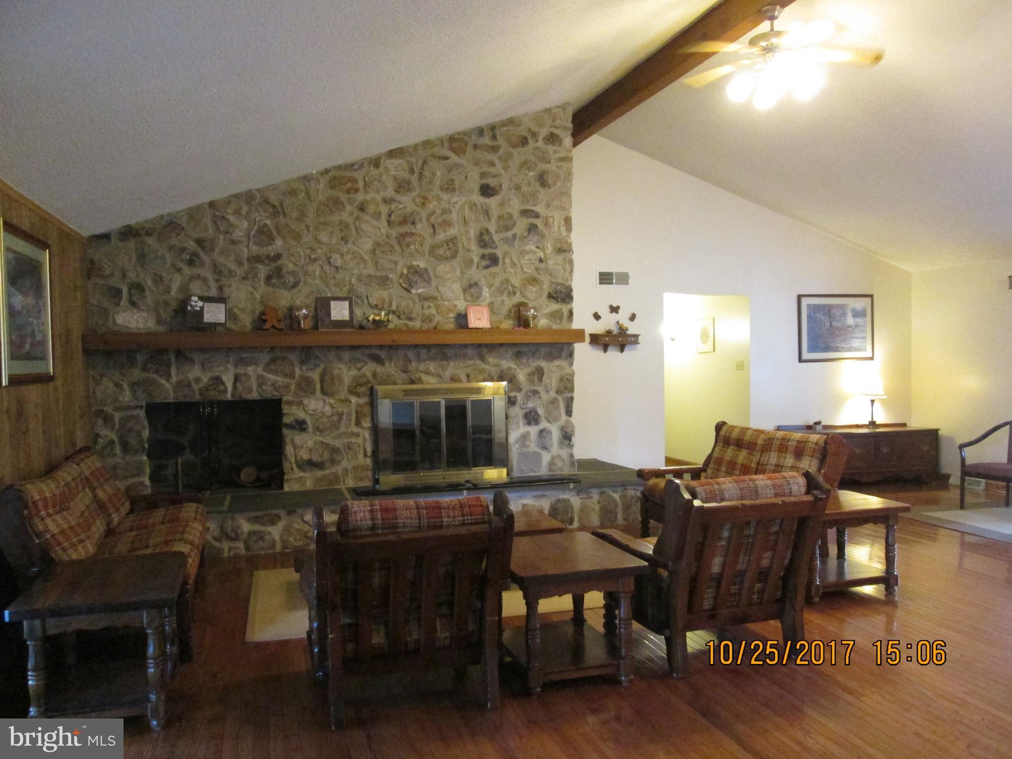 Large great room w/ stone fireplace