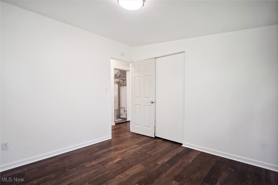 6683 Sherborn Road Cleveland, OH 44130 - Photo 28 of 42 Empty room featuring dark hardwood / wood-style floors
