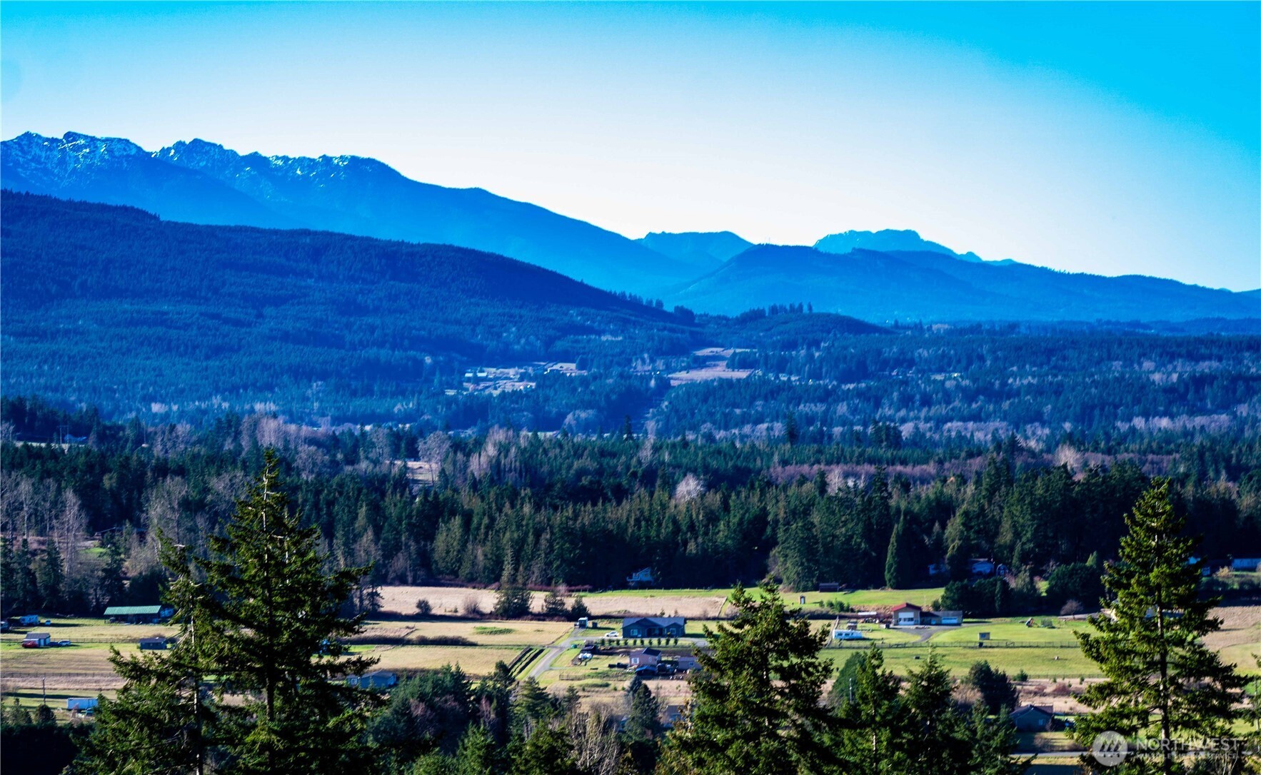 3 Hillside Drive Sequim, WA 98382 - Photo 22 of 27 a view of a city with a mountain