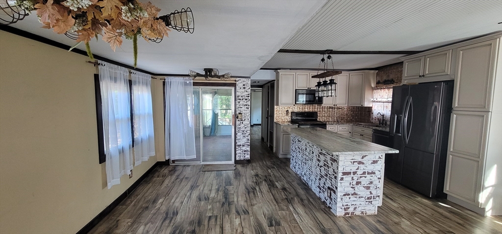 25 Windswept Road Wareham, MA 02571 - Photo 15 of 39 a kitchen with stainless steel appliances granite countertop a refrigerator and a sink