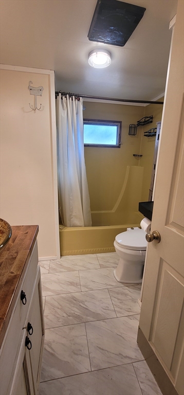 25 Windswept Road Wareham, MA 02571 - Photo 36 of 39 a bathroom with a granite countertop sink toilet and shower