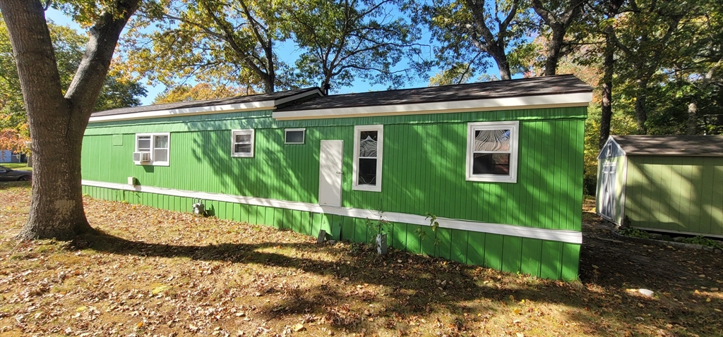 25 Windswept Road Wareham, MA 02571 - Photo 10 of 39 a front view of a house with a yard