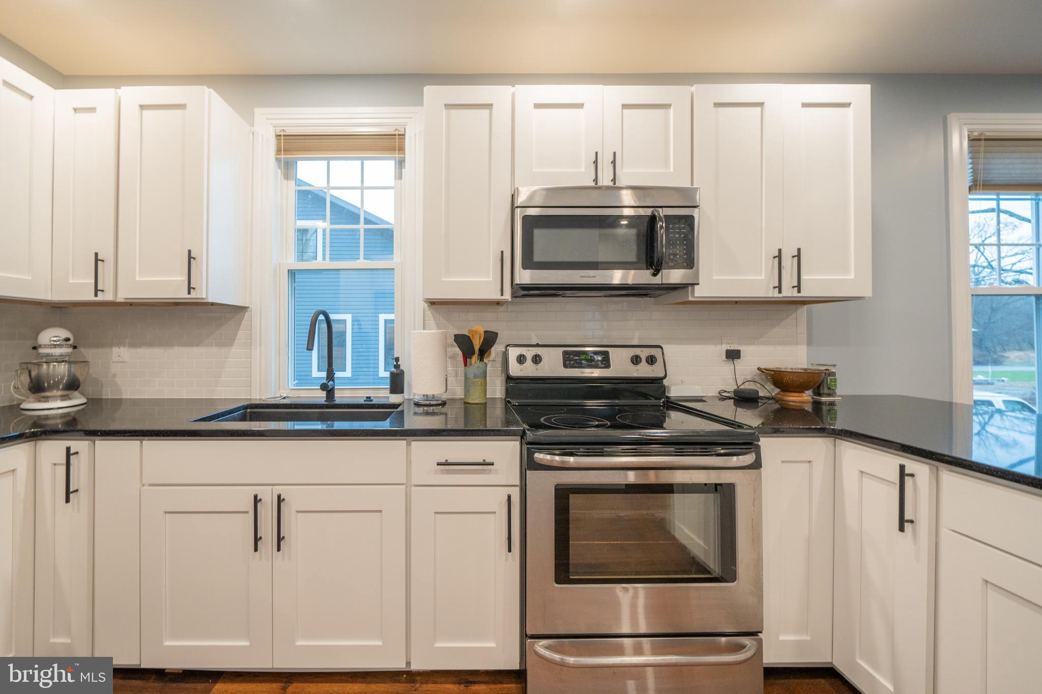 5 Station Way Road Chadds Ford, PA 19317 - Photo 11 of 18 Kitchen overlooking side yard
