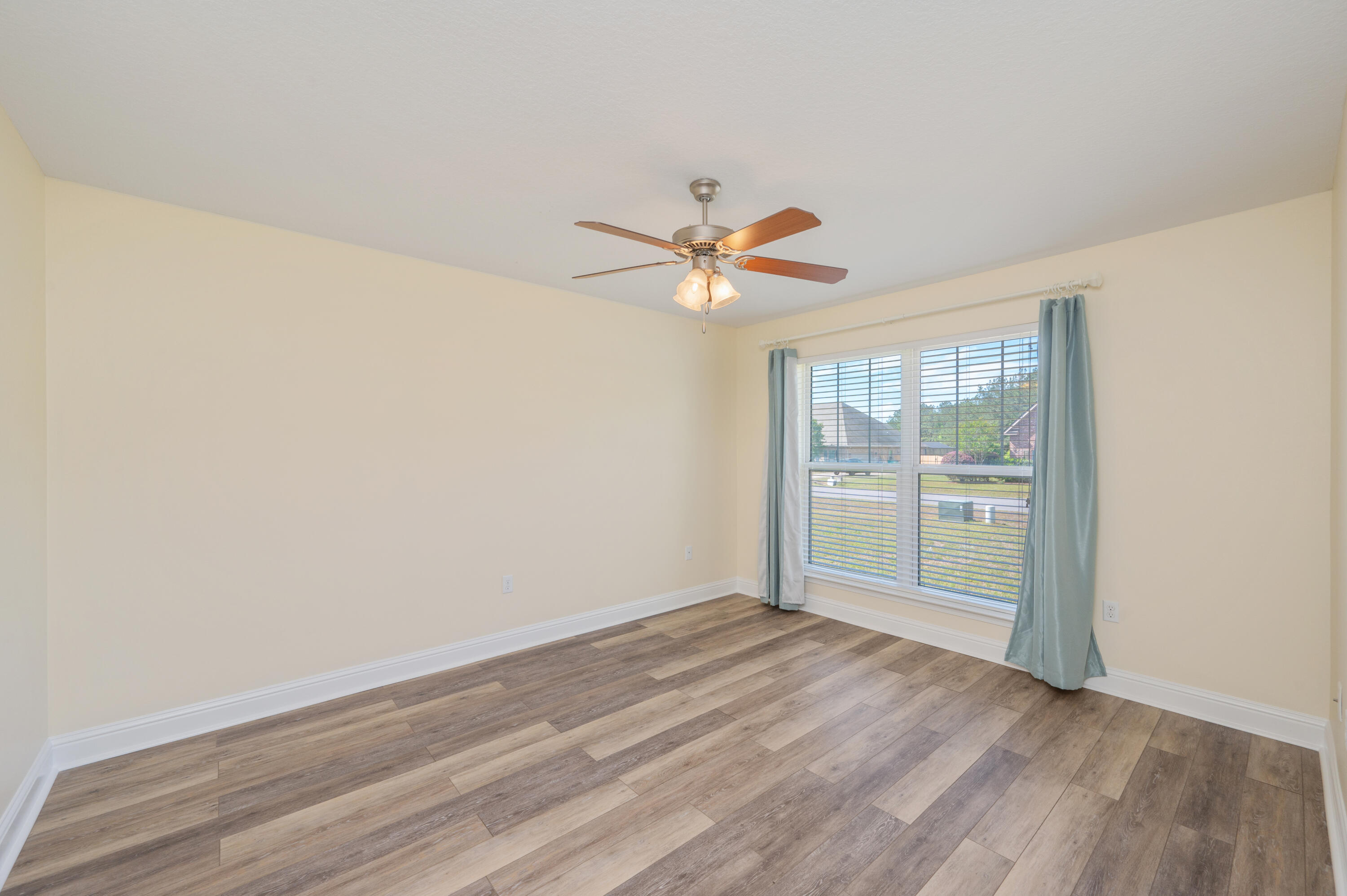 3361 Citrine Circle Crestview, FL 32539 - Photo 24 of 34 wooden floor in an empty room