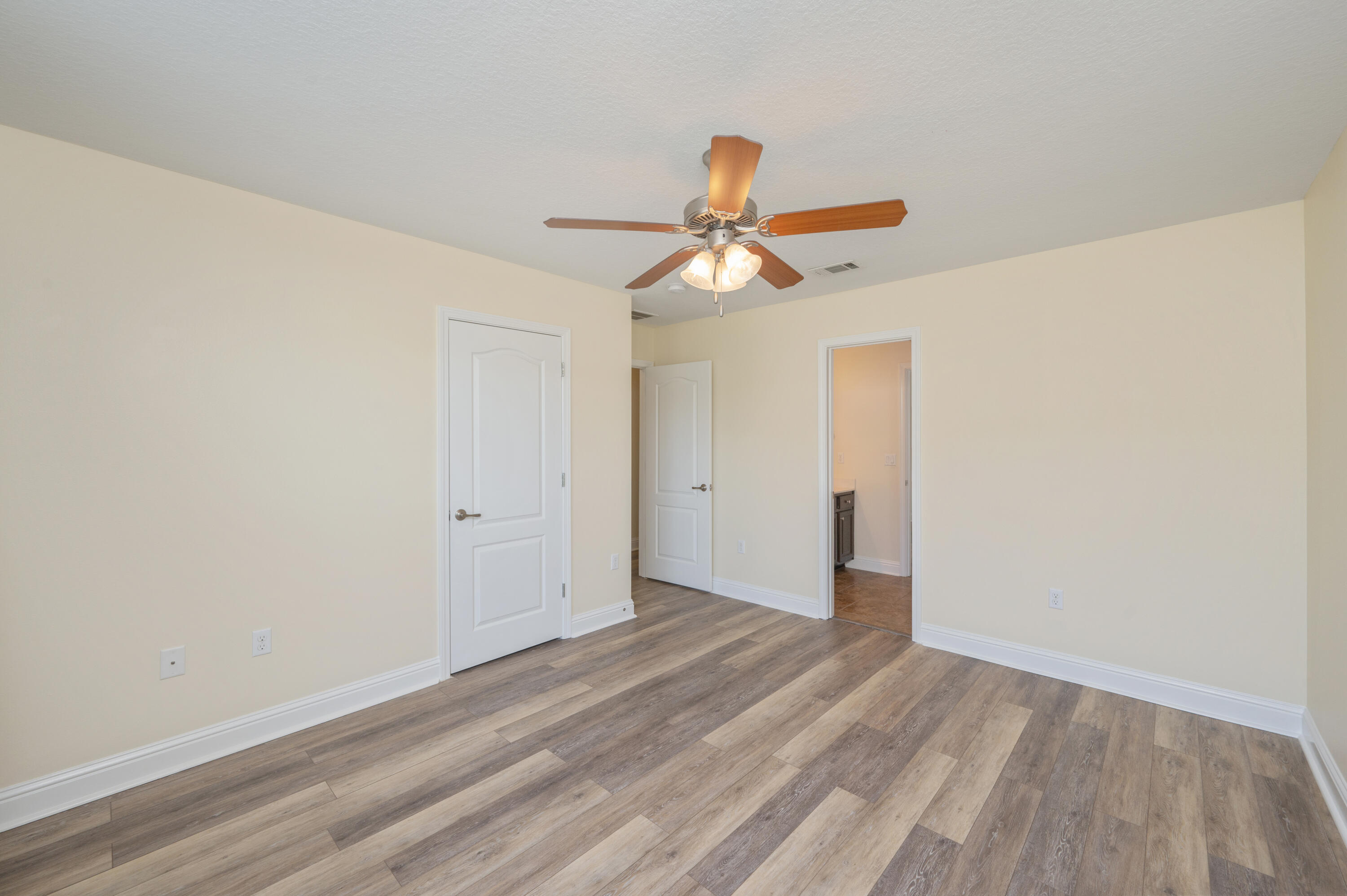 3361 Citrine Circle Crestview, FL 32539 - Photo 25 of 34 wooden floor in an empty room