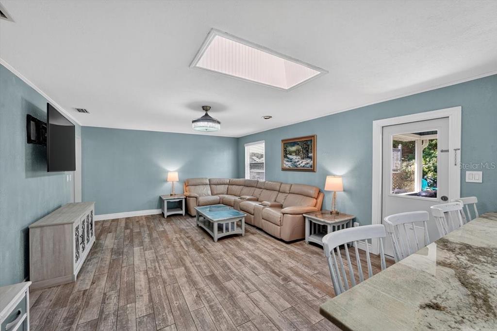 24 Heather Lane Ormond Beach, FL 32174 - Photo 25 of 50 a living room with furniture and a flat screen tv