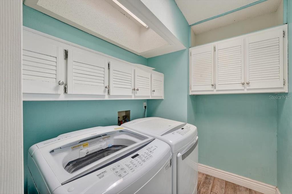 24 Heather Lane Ormond Beach, FL 32174 - Photo 38 of 50 a utility room with dryer and washer