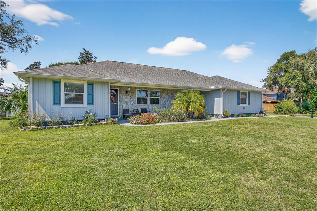 24 Heather Lane Ormond Beach, FL 32174 - Photo 7 of 50 a view of a house with a yard